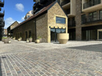 A photo from a recently completed BBS project, titled 'Elevating Brentford Waterfront with BBS Natural Stone'